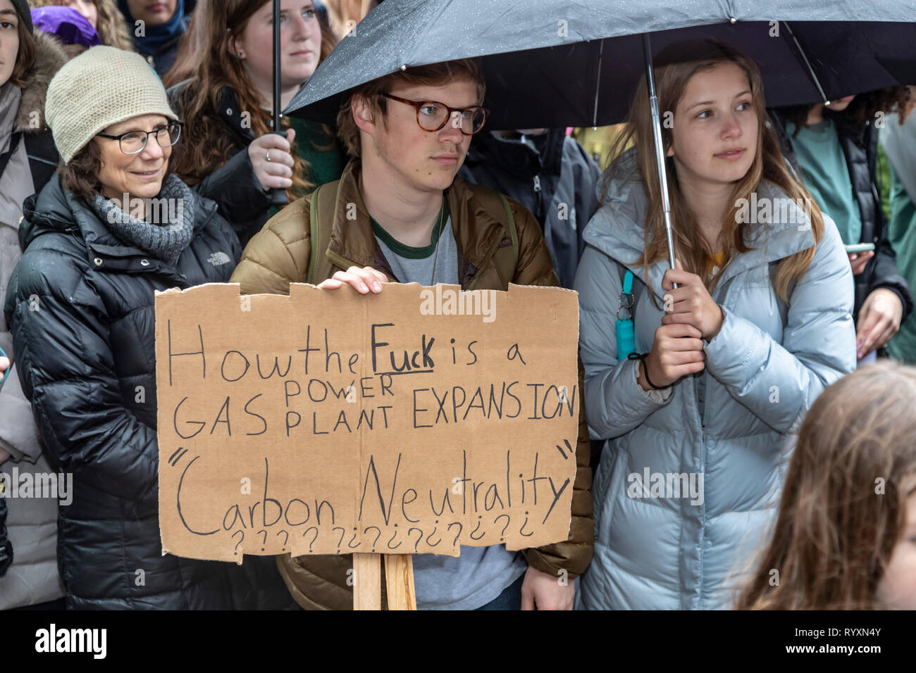 Ann Arbor, Michigan, USA. 15th Mar, 2019. Students rallied at the University of Michigan as part of an international strudent strike against climate change. They called for a reduction in greenhouse gas emissions and implementation of the Green New Deal proposed in Congress. Credit: Jim West/Alamy Live News Stock Photo