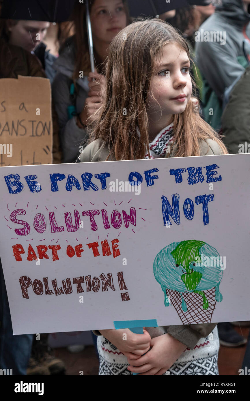 Ann Arbor, Michigan, USA. 15th Mar, 2019. Students rallied at the University of Michigan as part of an international strudent strike against climate change. They called for a reduction in greenhouse gas emissions and implementation of the Green New Deal proposed in Congress. Credit: Jim West/Alamy Live News Stock Photo