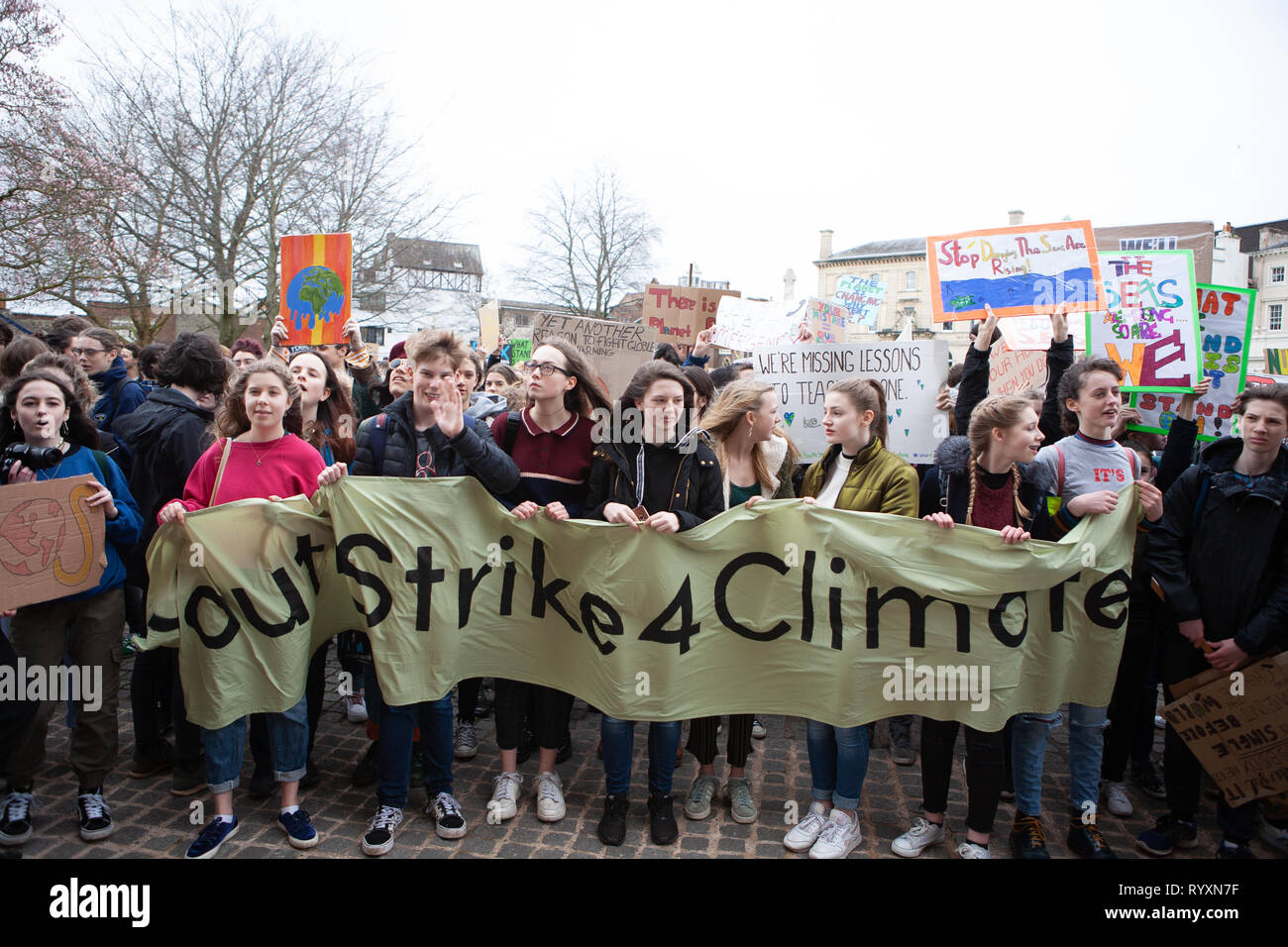 Students from across Devon, UK, come together on a Fridays 4 Future protest march to highlight climate change with Youth Strike 4 Climate Stock Photo