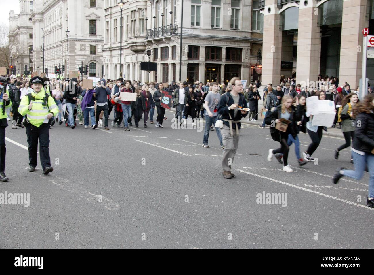London, UK. 15th Mar 2019. 2nd UK-wide Youth Strike for Climate Brings Parliament Square and Westminster Bridge to a standstill after protesters block traffic into two main routes into the area Credit: Knelstrom Ltd/Alamy Live News Stock Photo