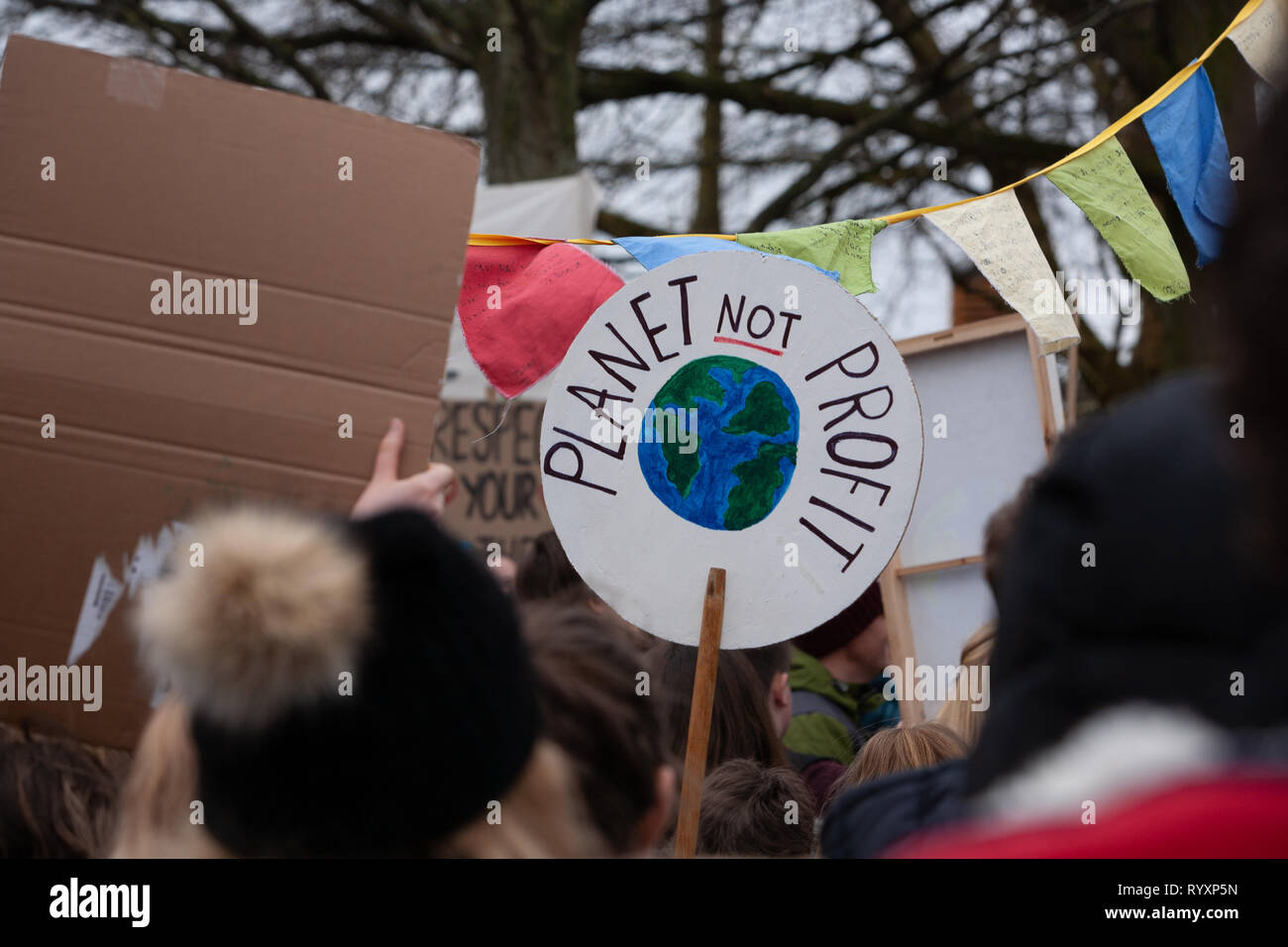 Students from across Devon, UK, come together on a Fridays 4 Future protest march to highlight climate change with Youth Strike 4 Climate Stock Photo