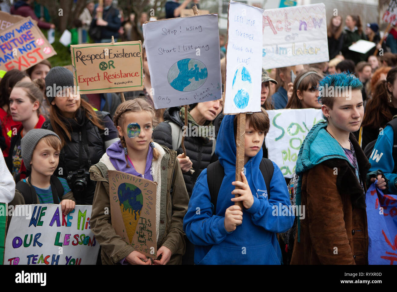 Students from across Devon, UK, come together on a Fridays 4 Future protest march to highlight climate change with Youth Strike 4 Climate Stock Photo