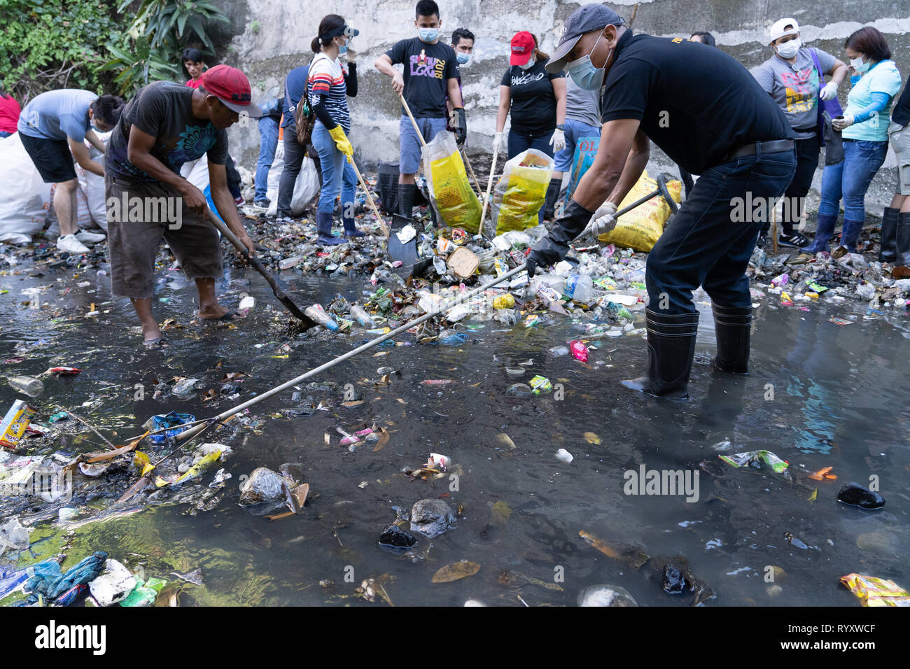 Cebu City, Philippines. 16th Mar, 2019. Hundreds of volunteers help with a River clean up initiated by the Cebu City Government to clean three rivers within the City declared as environmentally dead.A recent report by NGO organisation GAIA (Global Alliance for Incinerator Alternatives) highlights the shocking use of single use plastic within the Philippines.Figures include some 60 billion single use sachets,57 million shopping bags + an estimated 16.5 billion smaller plastic bags known as 'Labo'  being used annually. Credit: imagegallery2/Alamy Live News Stock Photo