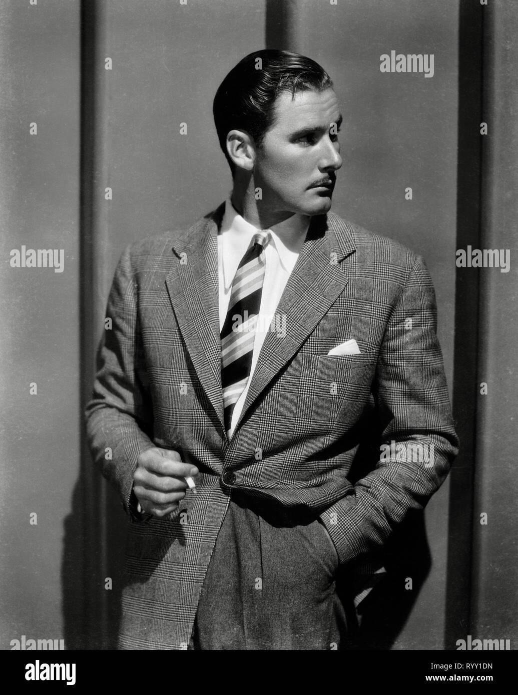 Errol Flynn, circa (1935) File Reference # 33751 897THA Stock Photo - Alamy