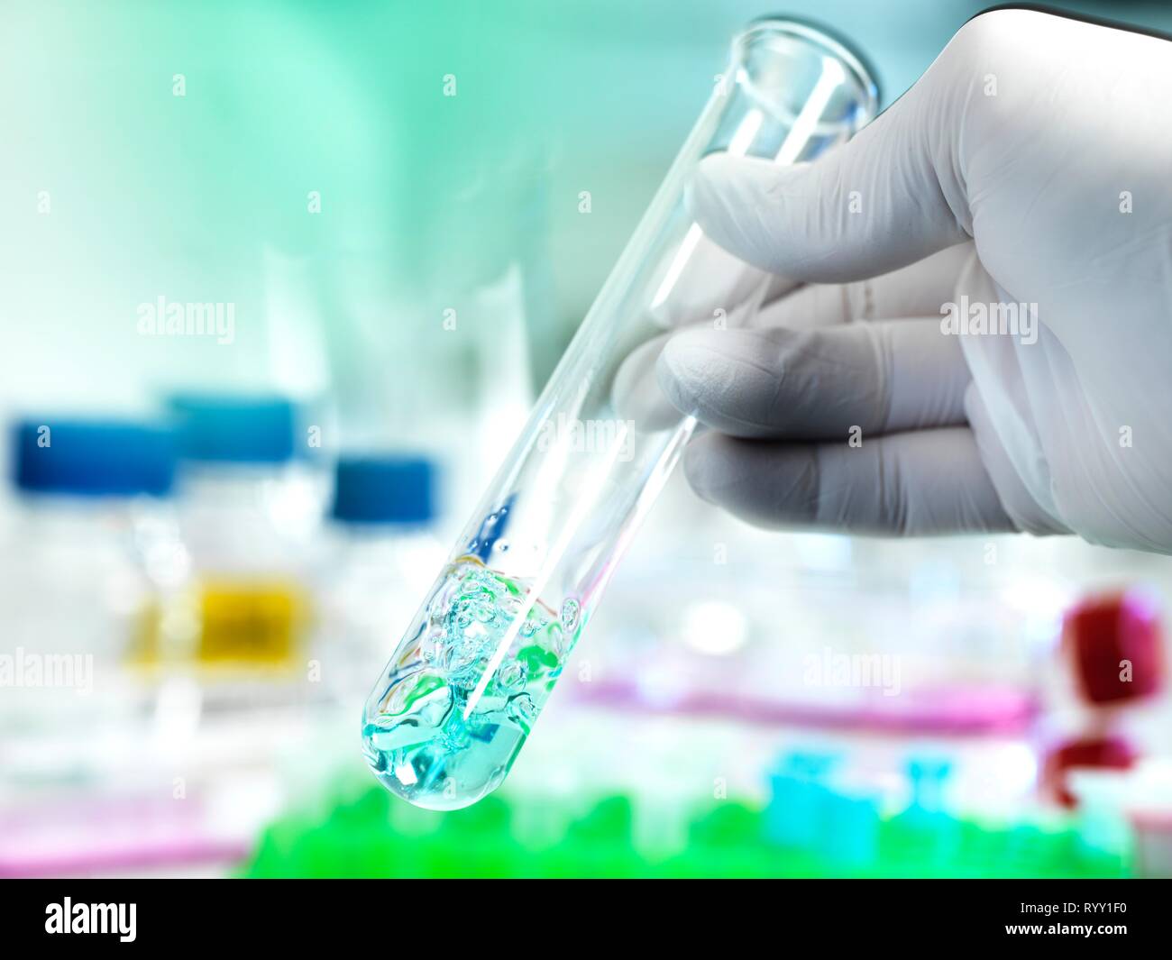Scientist mixing formula test tube hi-res stock photography and images - Alamy