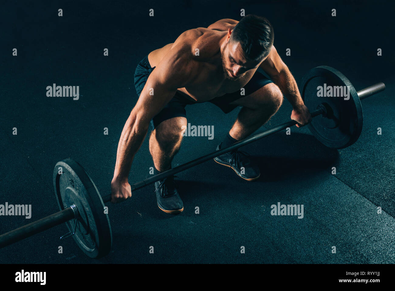 Man lifting weights. Stock Photo