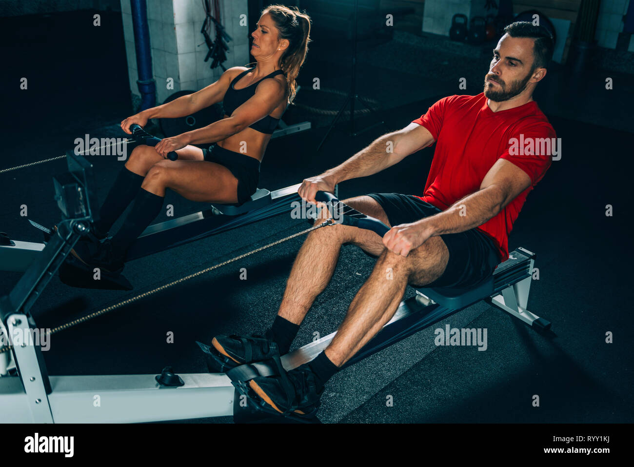 Rowing machine workout Stock Photo Alamy