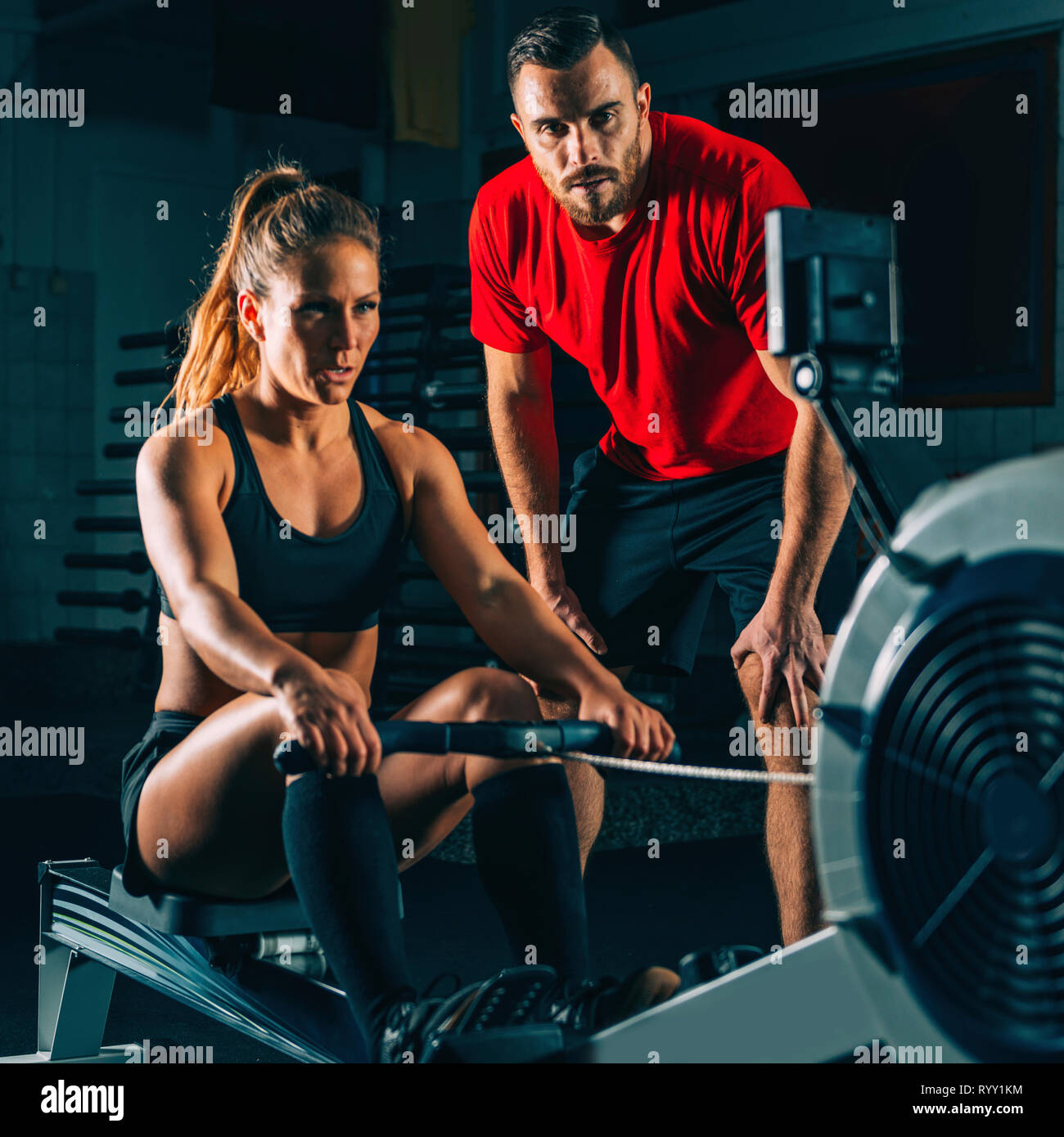 Rowing machine workout Stock Photo Alamy