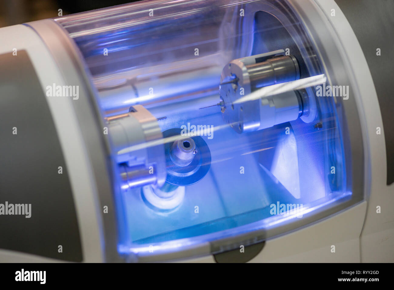 Dental ceramic reconstruction milling machine. Stock Photo