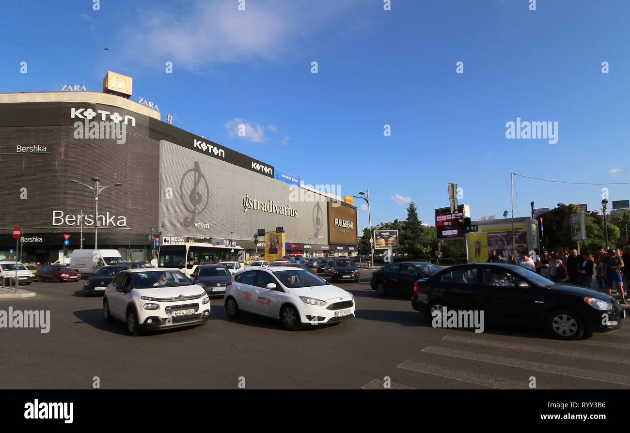 Bucharest, Romania - May 17, 2018: Car traffic near the Bershka and Koton  stores located in Unirea Shopping Center, in Unirii Square, Bucharest,  Roman Stock Photo - Alamy