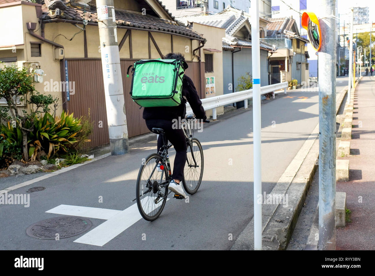 An Uber Eats delivery guy in Osaka, Japan Stock Photo - Alamy