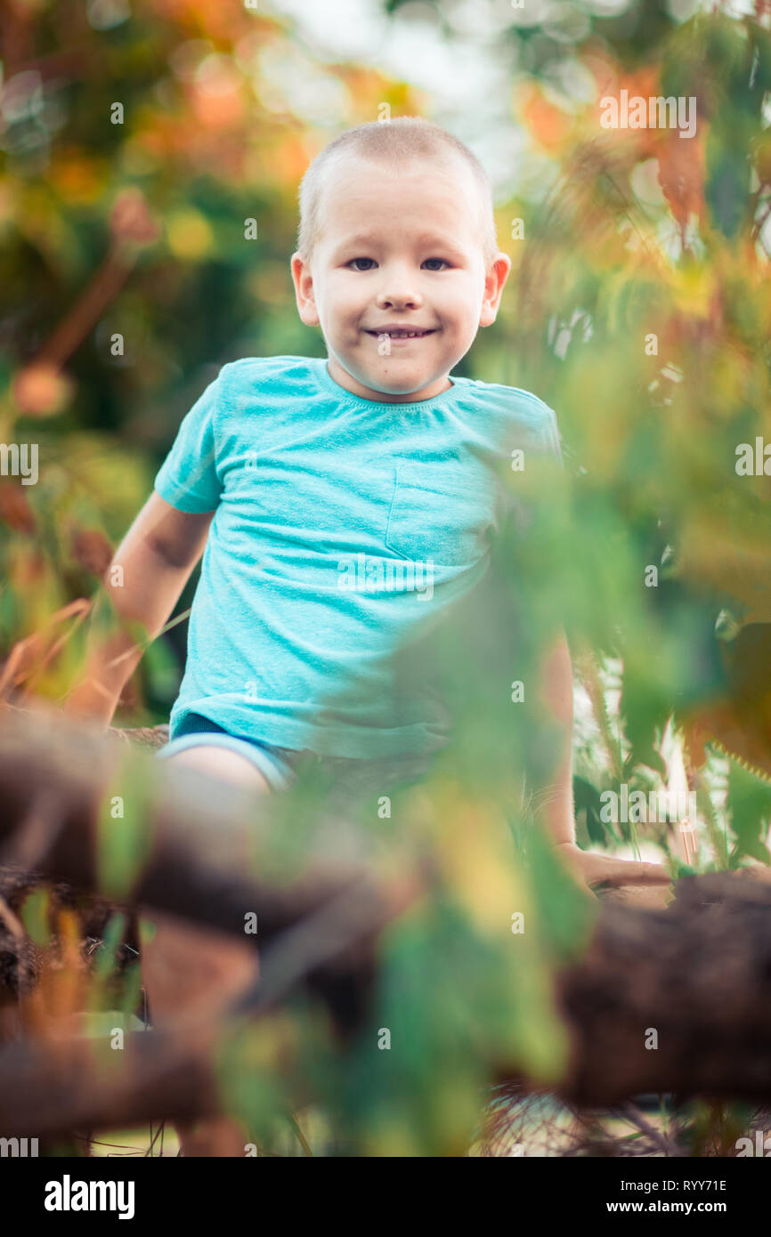 Outdoor portrait of cute little smiling boy Stock Photo - Alamy