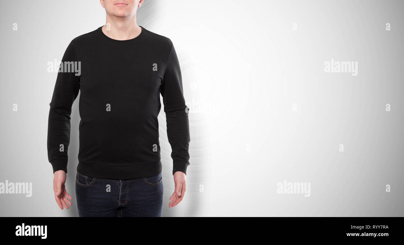 Man in black sweatshirt, black hoodies isolated on white background. mock up Stock Photo