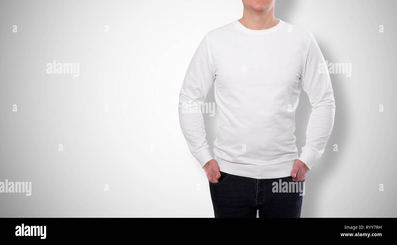 young man in white sweatshirt, white hoodies isolated on grey background. mock up Stock Photo