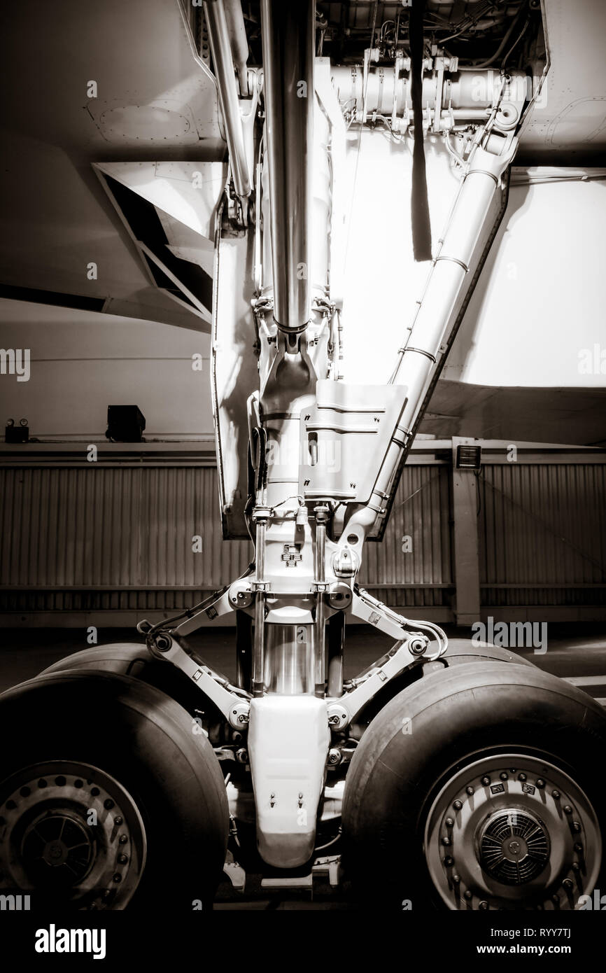 Commercial airplane landing gear detail. Black and white Stock Photo ...