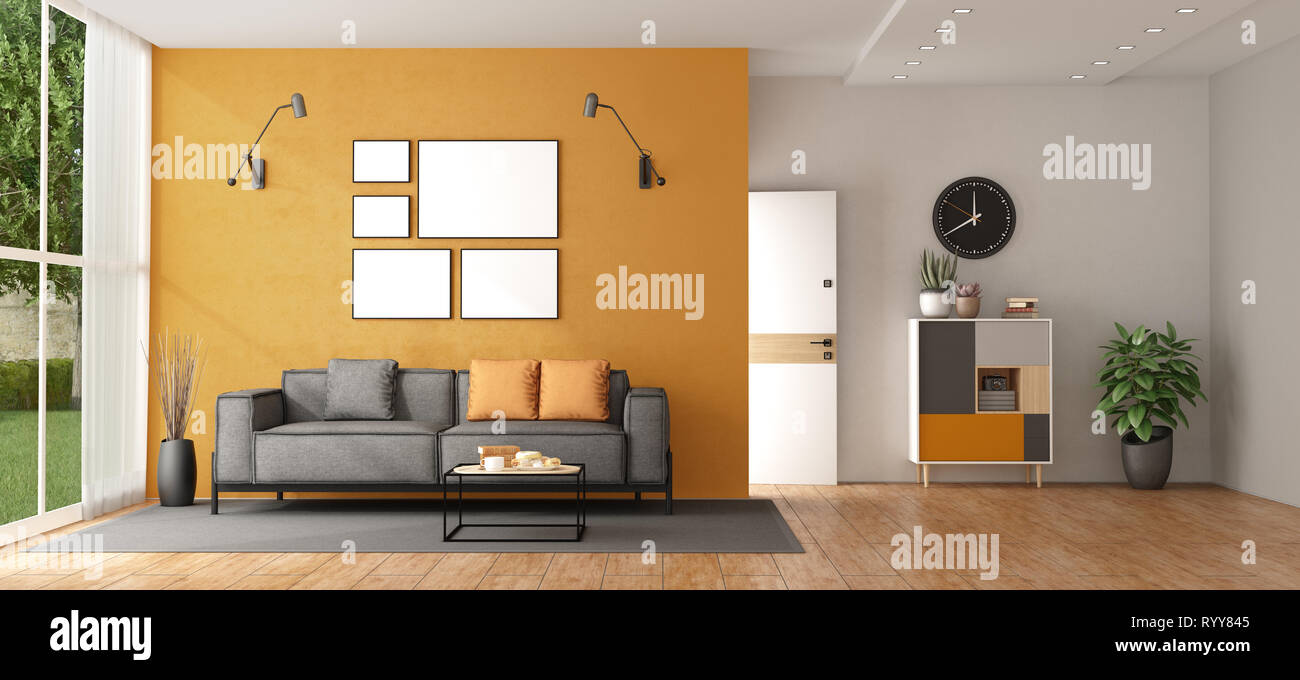 Living Room Of A Modern Villa With Gray Sofa Against Orange Wall