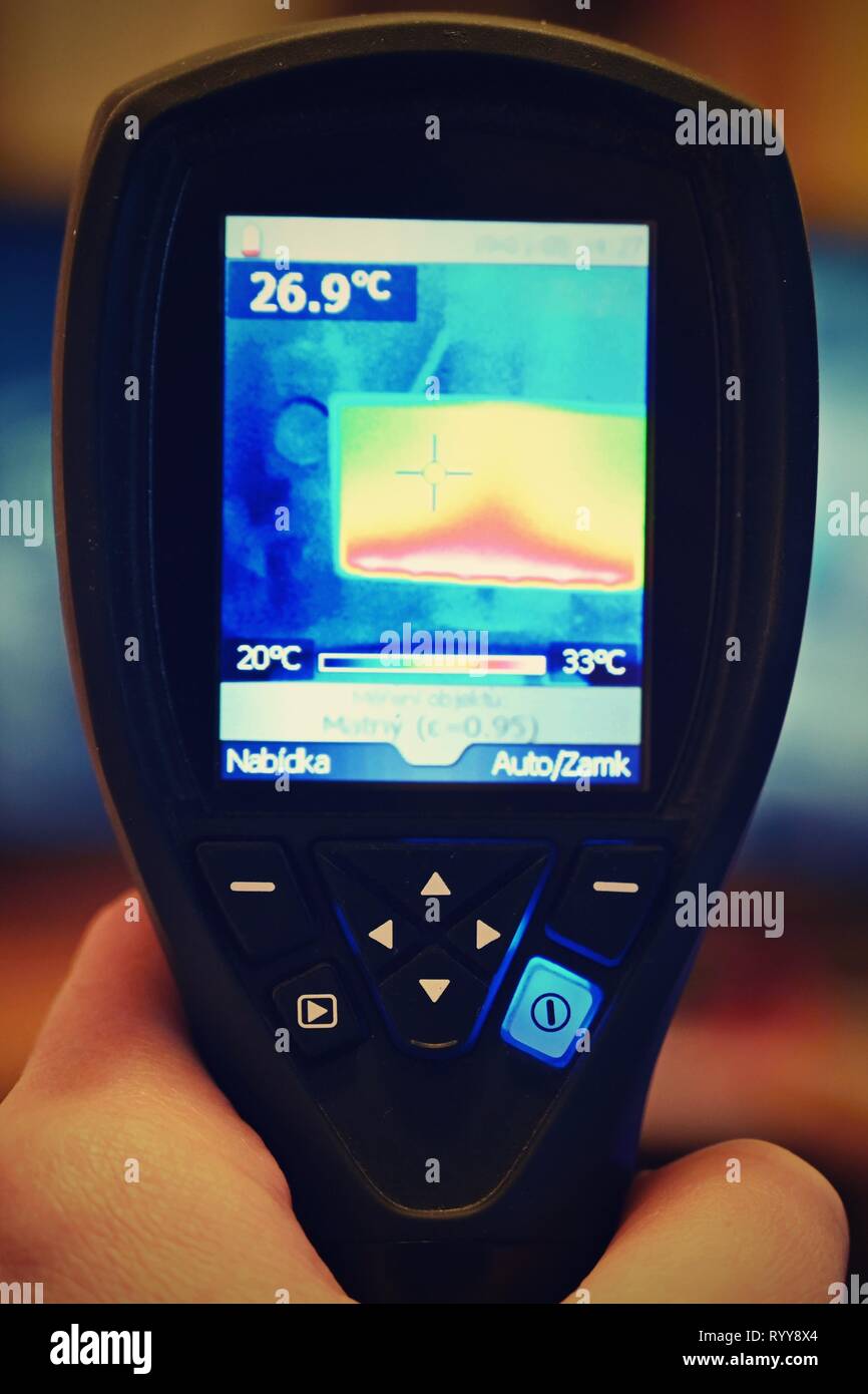 Hand thermal imaging camera to check temperature Stock Photo Alamy