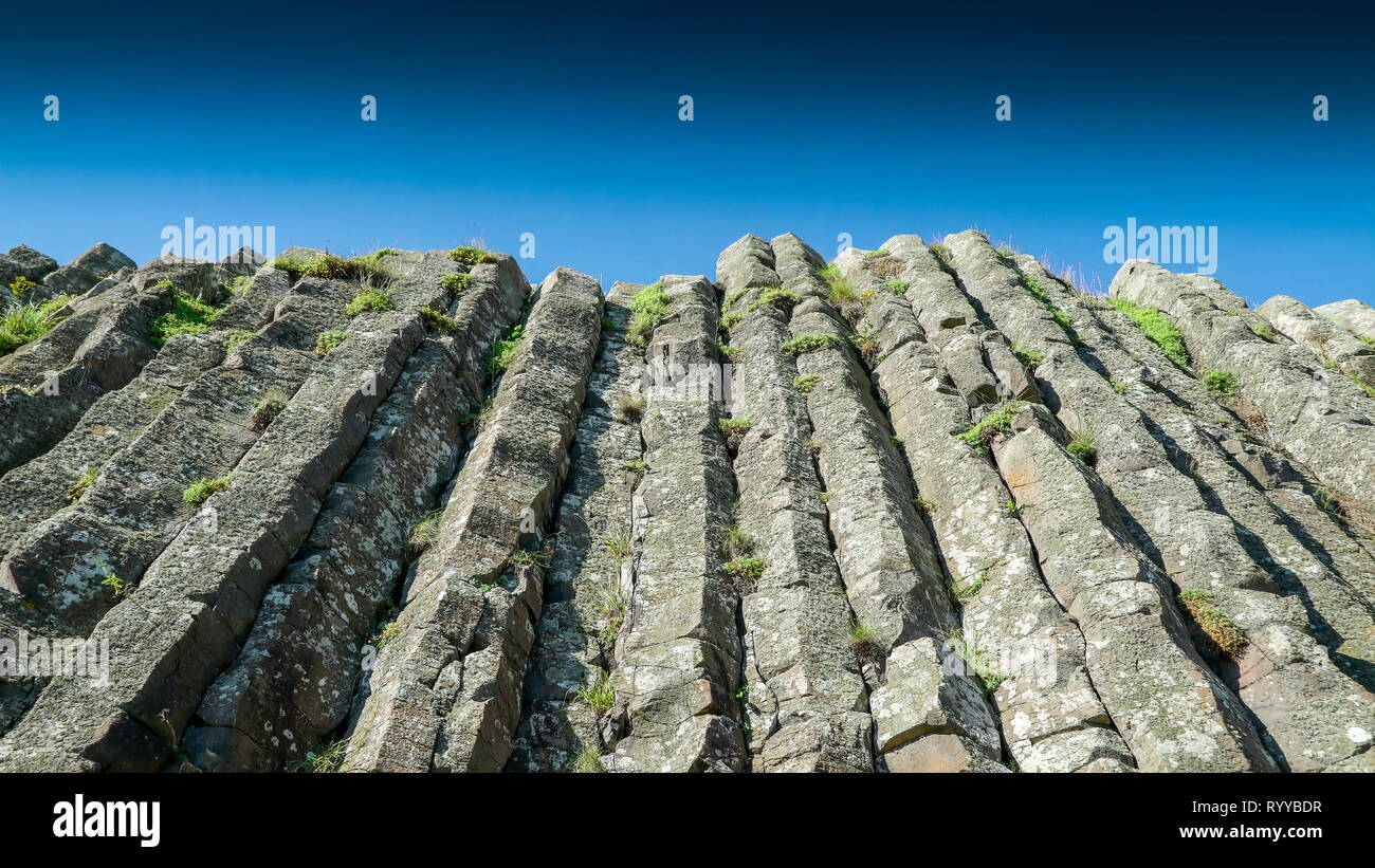 Closer look of the vertical rock formation in Giants Causeway in the Northern Ireland Stock Photo