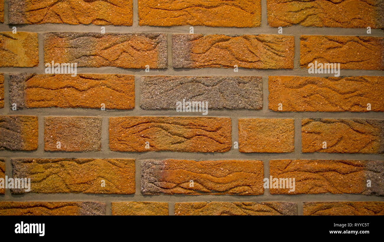 The red brick walls on a house or building the new bricks makes the