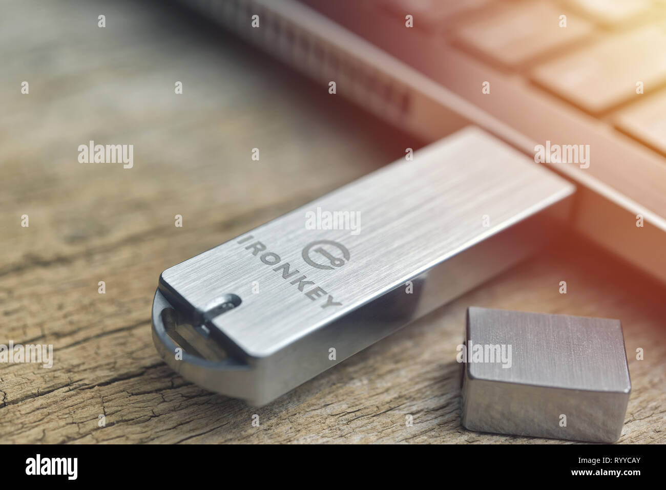 Galati, Romania - March 15, 2019: Close up of Kingston Ironkey ultra secure USB flash drive connected to laptop on wood desk Stock Photo