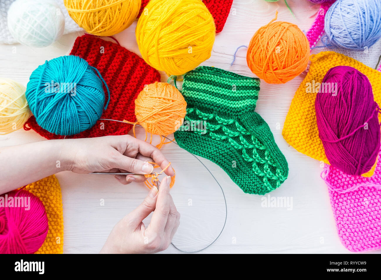 Woman's Hand Holds Large Knitting Needles Knitted Yarn Large Skein Stock  Photo by ©dalivl@yandex.ru 396078754