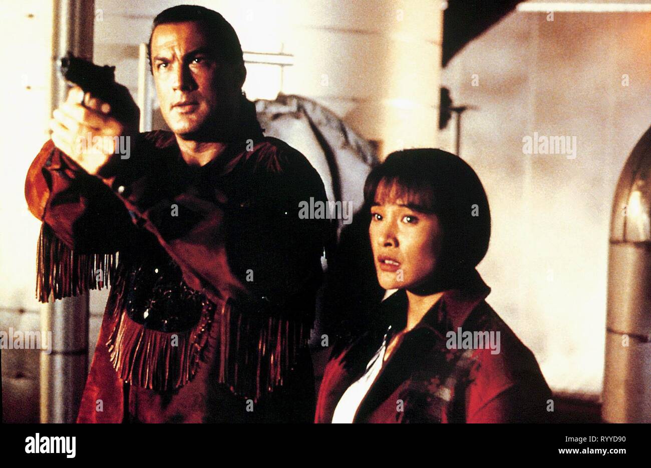 SEAGAL,CHEN, ON DEADLY GROUND, 1994 - Stock Image