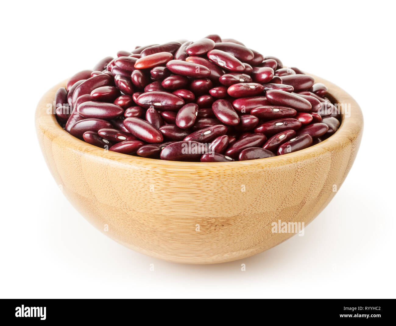 Uncooked red kidney beans in wooden bowl isolated on white background