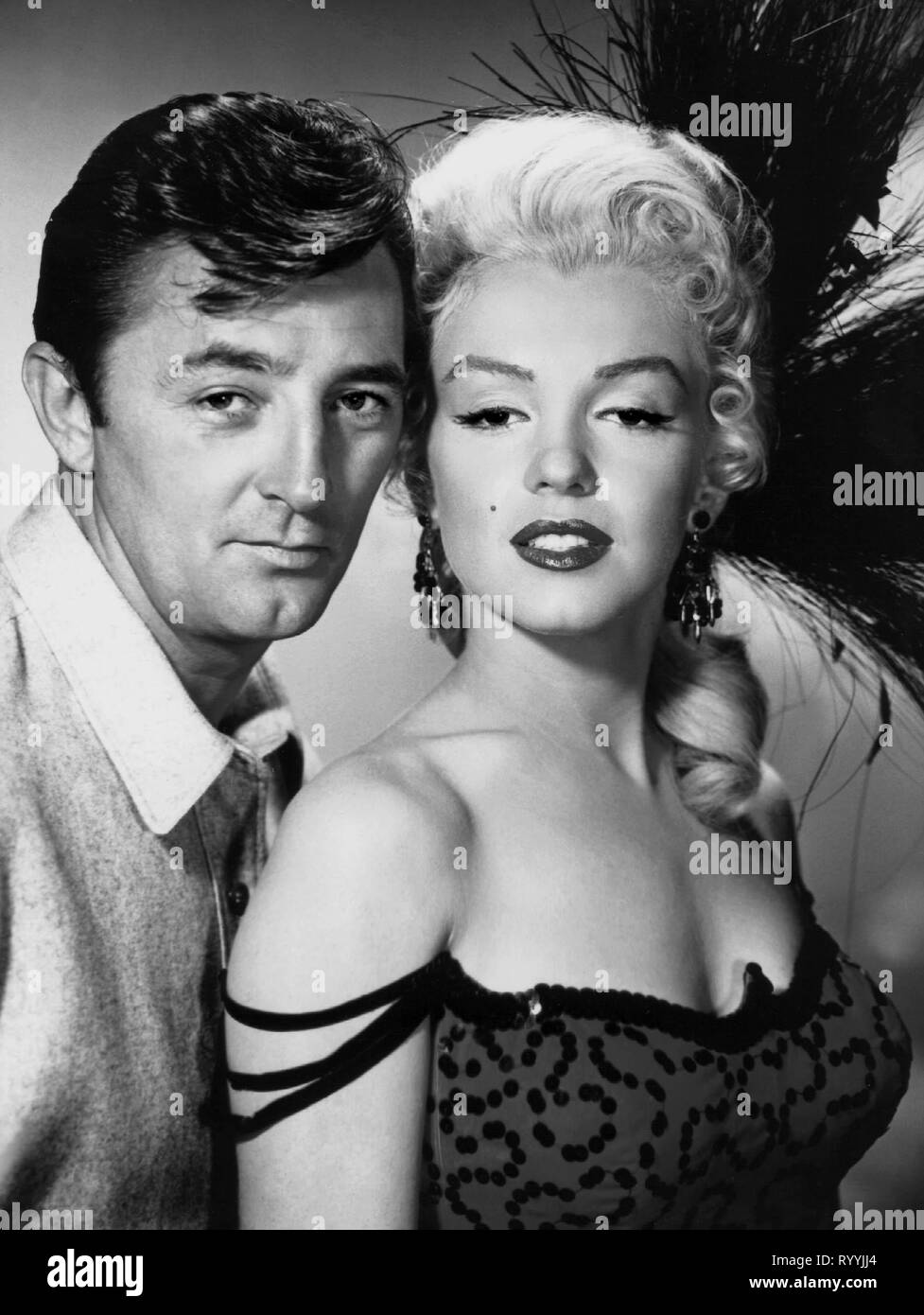 ROBERT MITCHUM, MARILYN MONROE, RIVER OF NO RETURN, 1954 Stock Photo