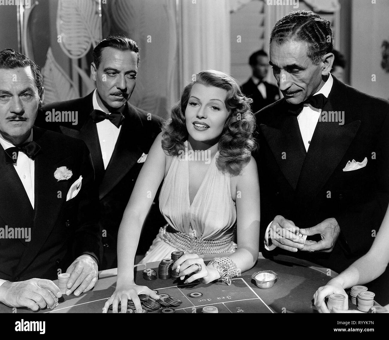 RITA HAYWORTH, JOSEPH GALLEIA, GILDA, 1946 Stock Photo