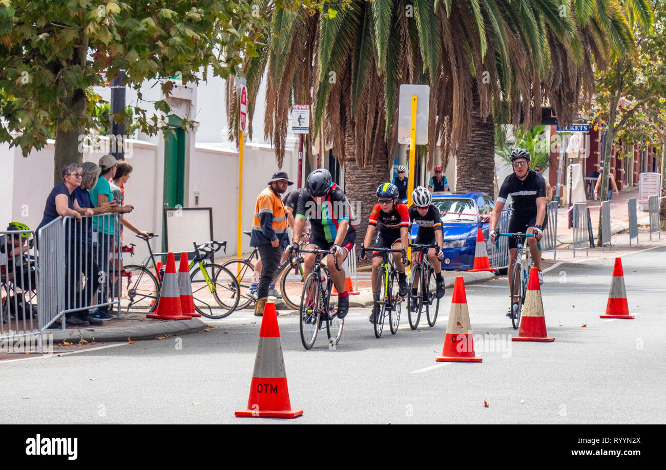Cyclists racing in The Ring Summer Criterium Series, road bike races in Northbridge March 2019, Perth WA Australia. Stock Photo