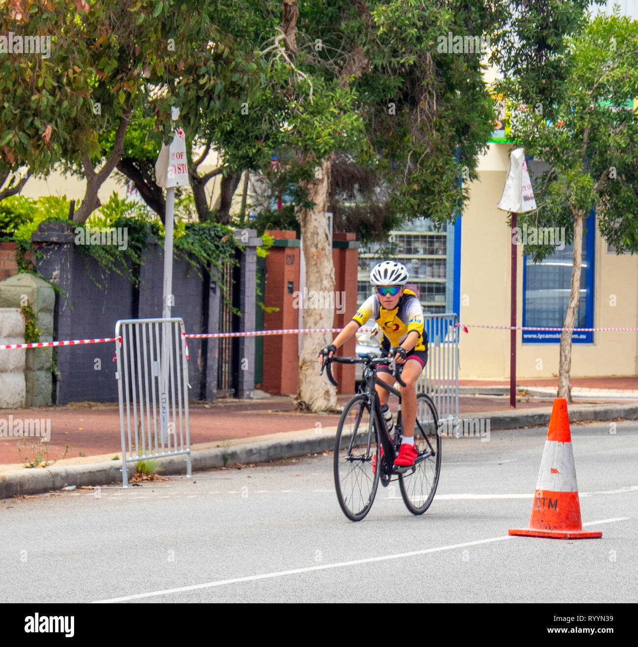 Cyclist racing in The Ring Summer Criterium Series, road bike races in Northbridge March 2019, Perth WA Australia. Stock Photo