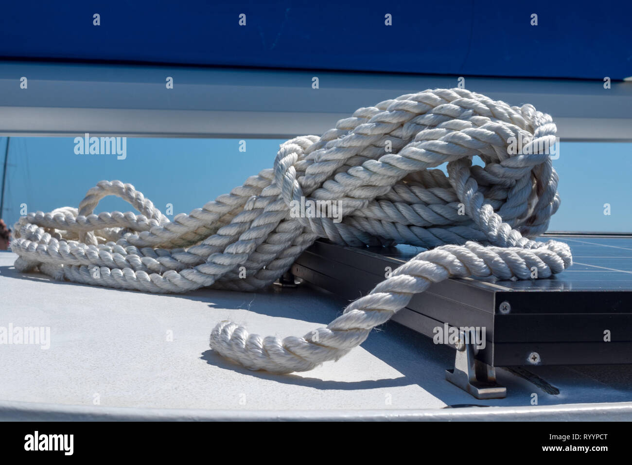 closeup on sailing rope. detail shot on coiled rope ready to set sail Stock Photo Alamy