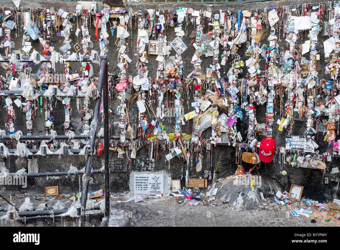 Rosaries and other offerings are left at an outdoor chapel near the giant statue of the Virgin Mary (Virgen de la Inmaculada Concepción) which stands  Stock Photo