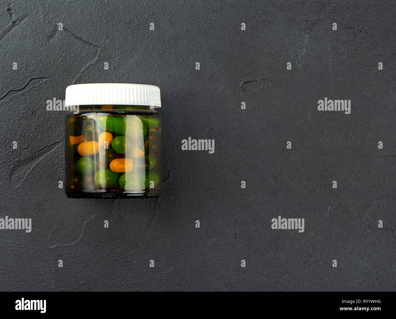 Download Yellow Pills In A Glass High Resolution Stock Photography And Images Alamy Yellowimages Mockups
