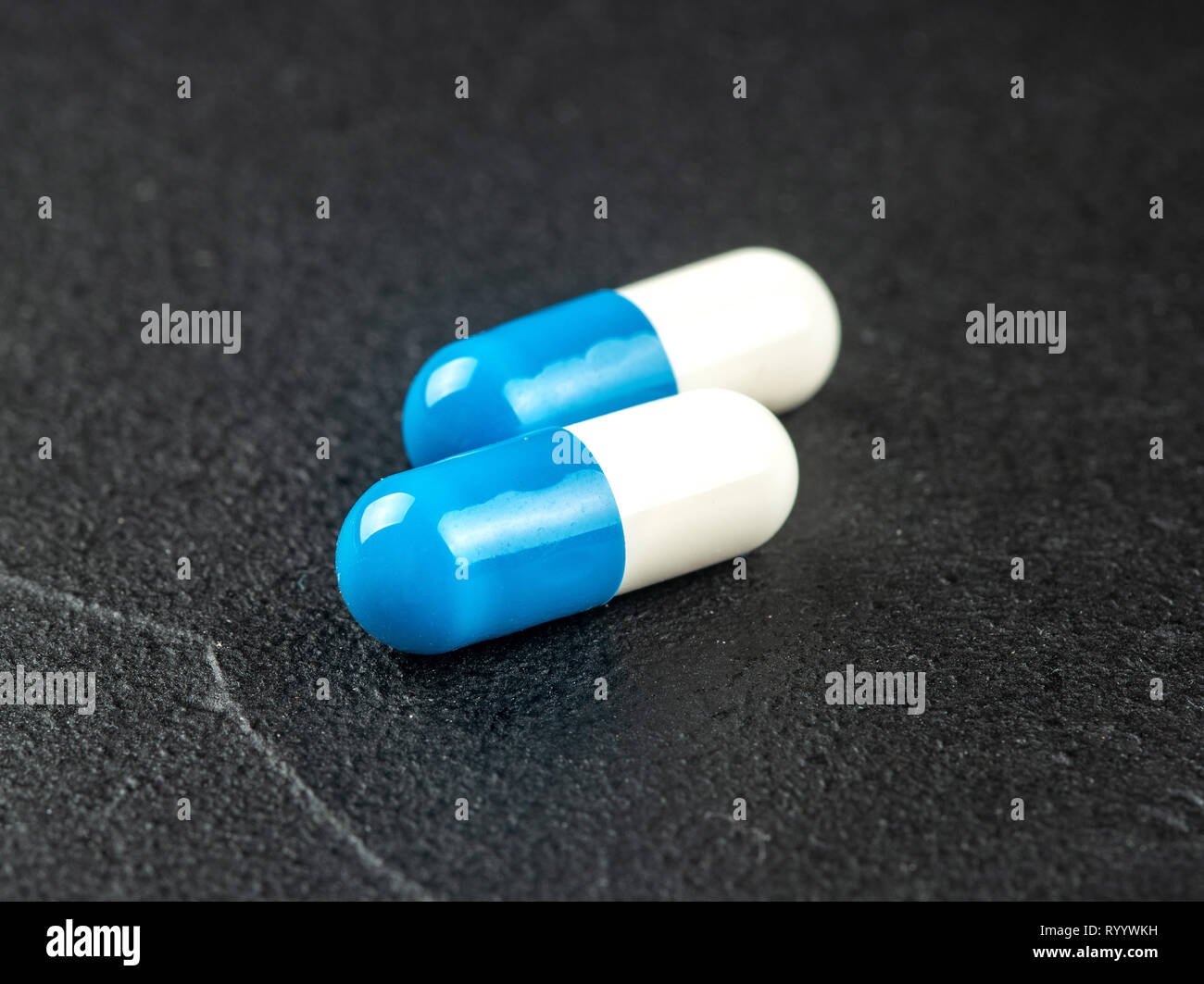 Blue and white capsule hi-res stock photography and images - Alamy