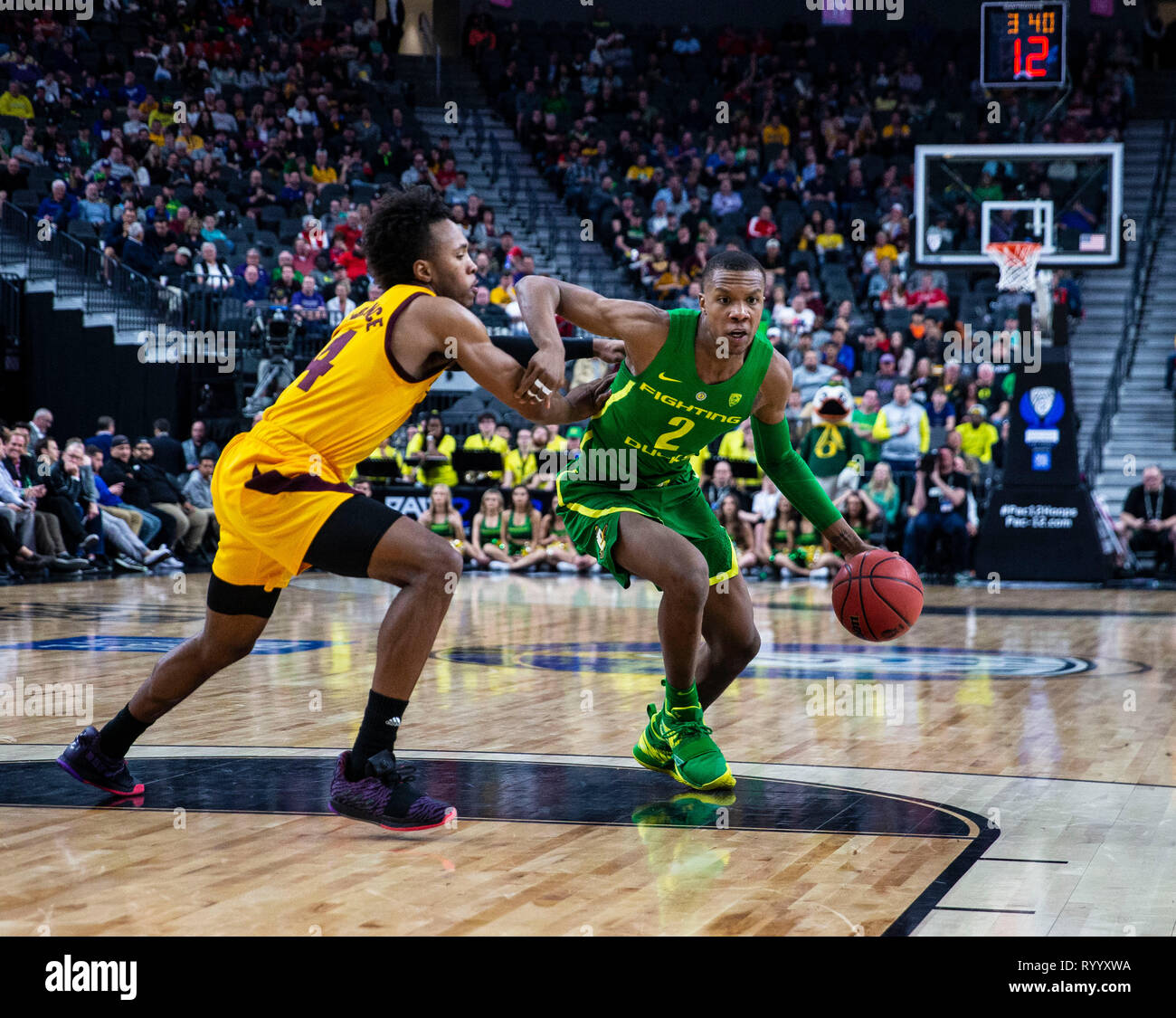 Las Vegas, NV, USA. 15th Mar, 2019. A. Oregon forward Louis King (2) drives to the hoop during the NCAA Pac 12 Men's Basketball tournament semi-final between the Oregon Ducks and the Arizona State Sun Devils 79-75 win at T Mobile Arena Las Vegas, NV. Thurman James/CSM/Alamy Live News Stock Photo