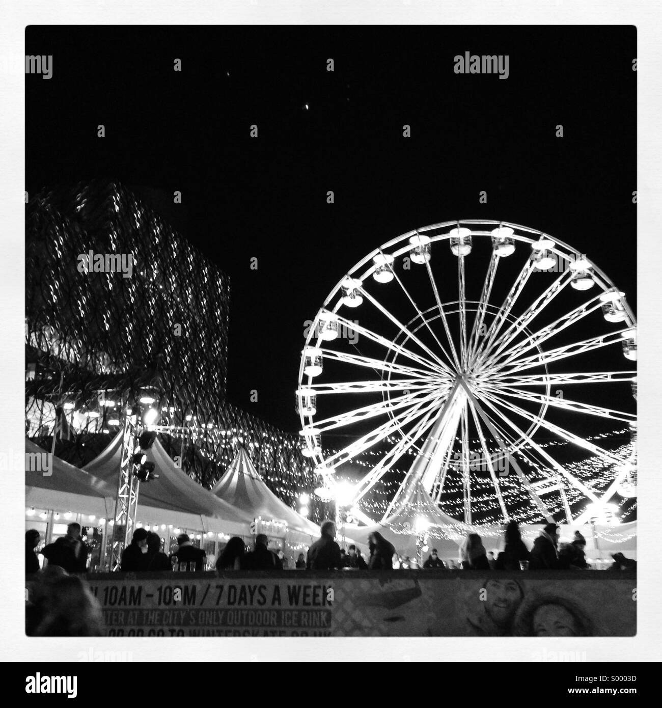 Christmas market at centenary square, Birmingham, UK with the library of Birmingham to the left. - Smartphone Captured Stock Image