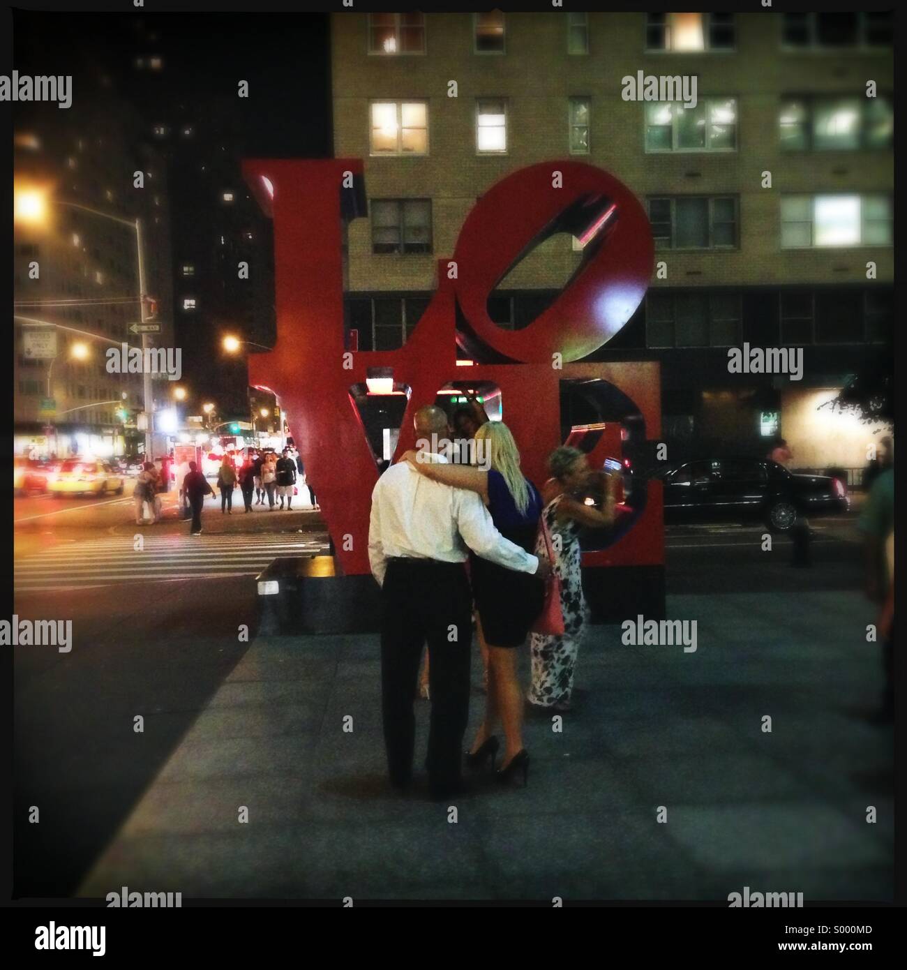 LOVE artwork on Manhattan sidewalk Stock Photo