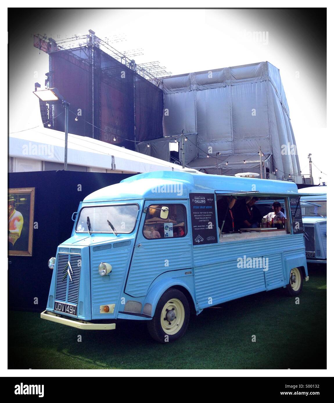 Food van behind main stage festival Stock Photo