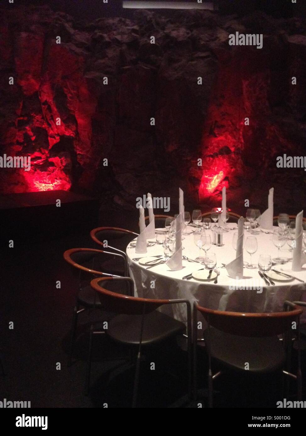 A large set empty table at the Lava Restaurant within the Blue Lagoon in Iceland, February 2014 - Smartphone Captured Stock Image