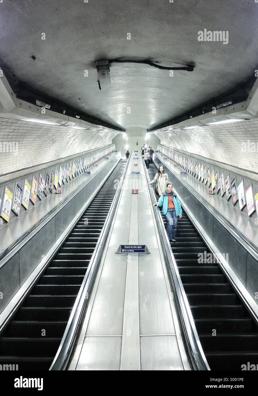 People going down the stairs at Kentish Town Underground - London Stock Photo
