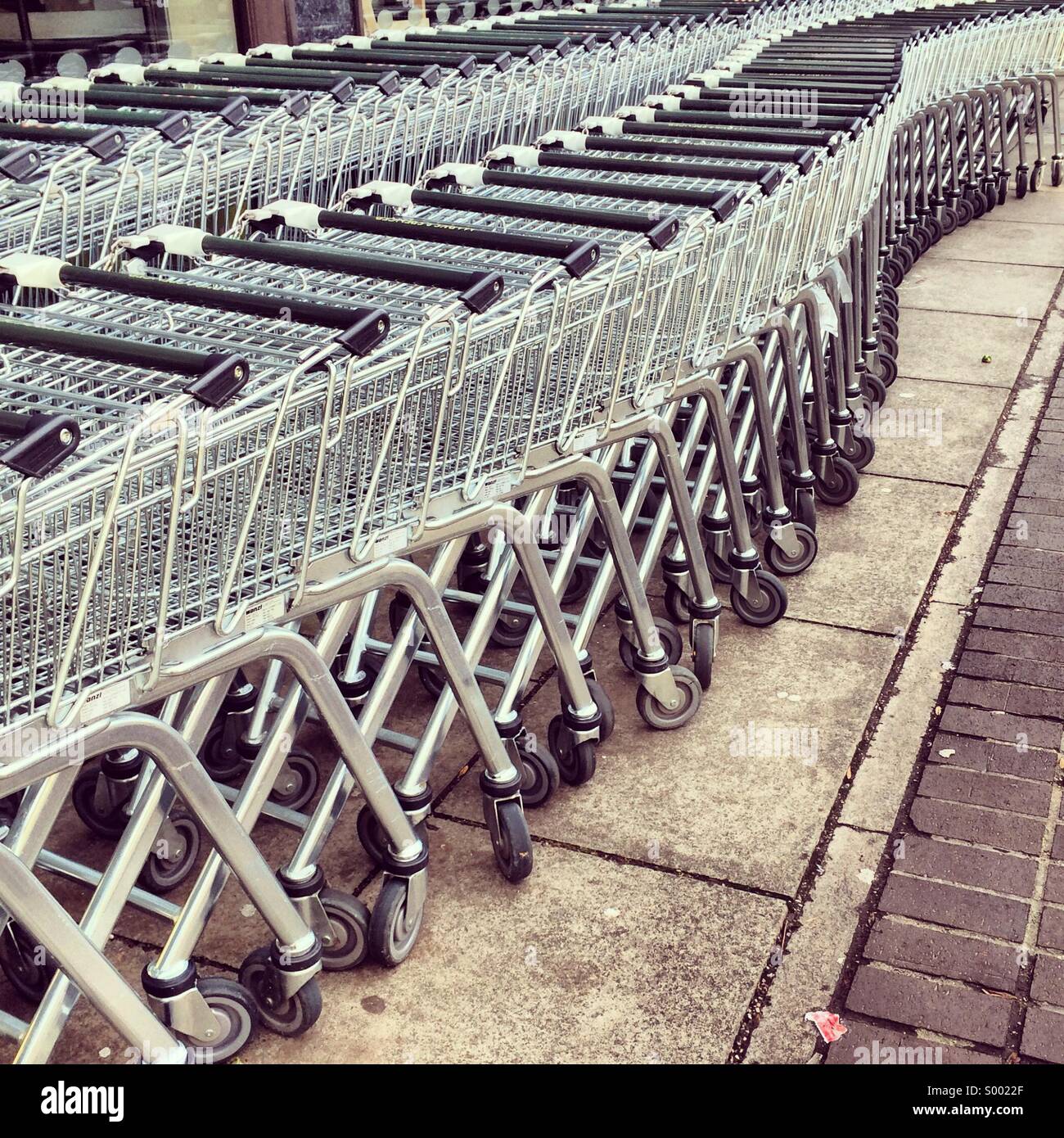 Supermarket trolleys Stock Photo