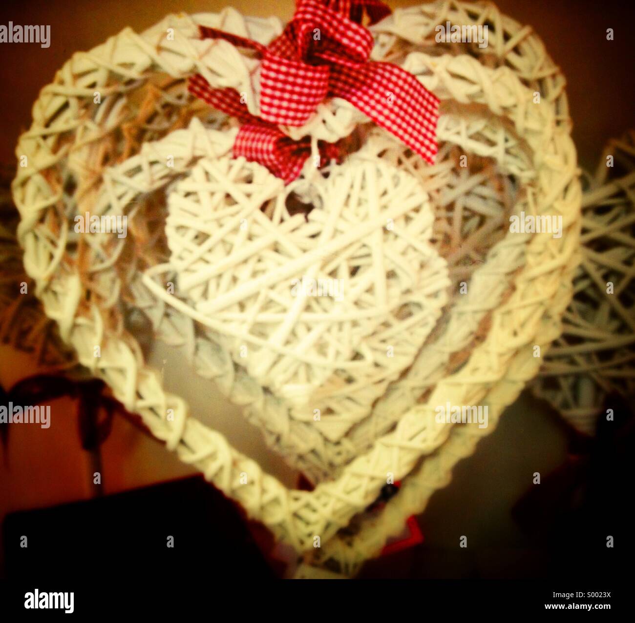 Happy Valentine, heart shaped wicker merchandise Stock Photo