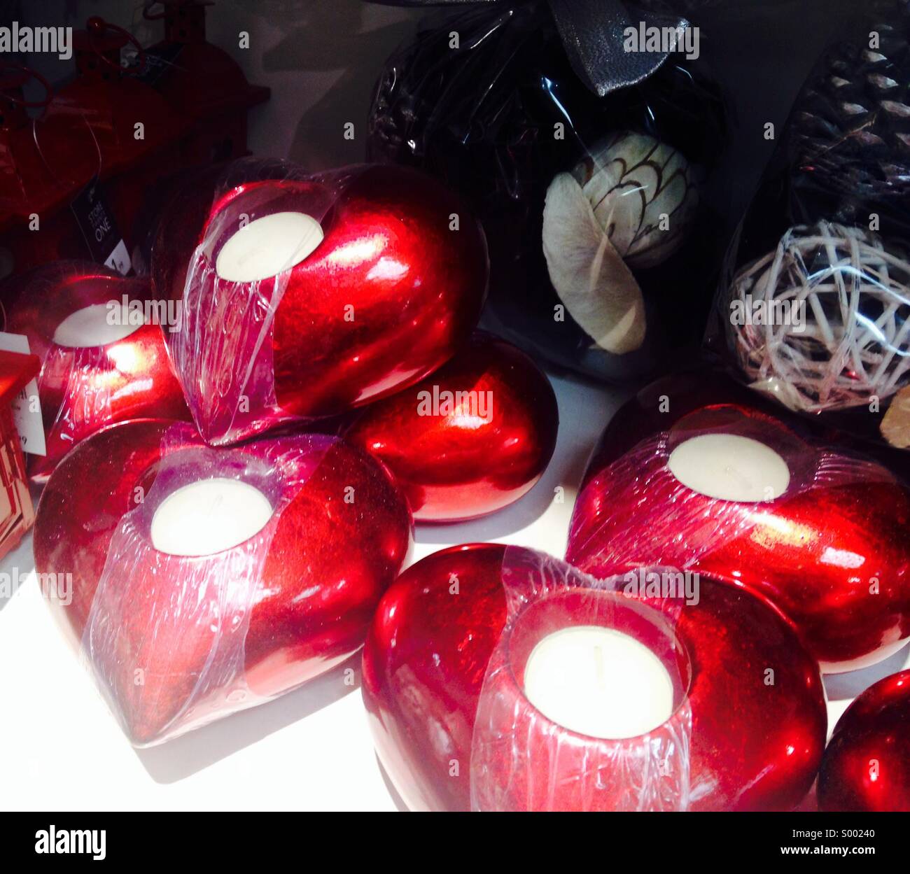 Heart shaped candle holders Stock Photo Alamy