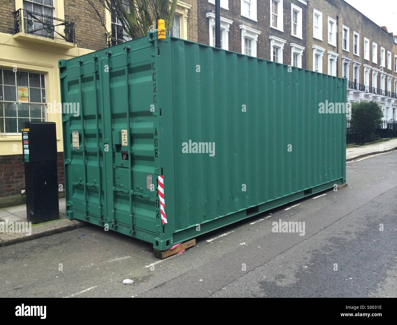 Container in a parking bay in Camden, London. - Smartphone Captured Stock Image