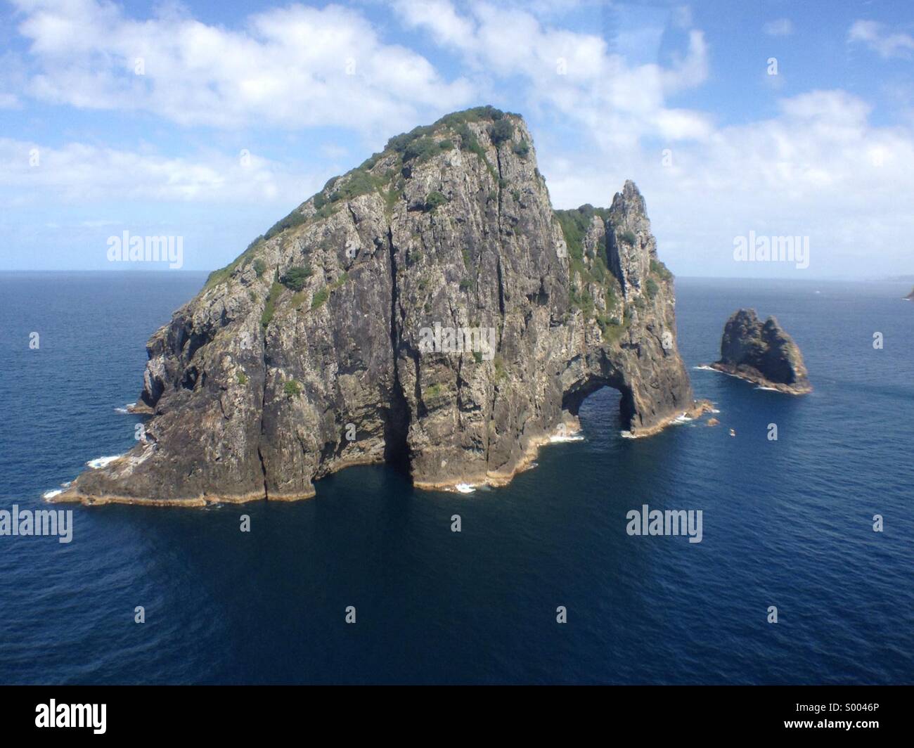 The famous hole in the rock in the bay of islands New Zealand. January 2014 Stock Photo