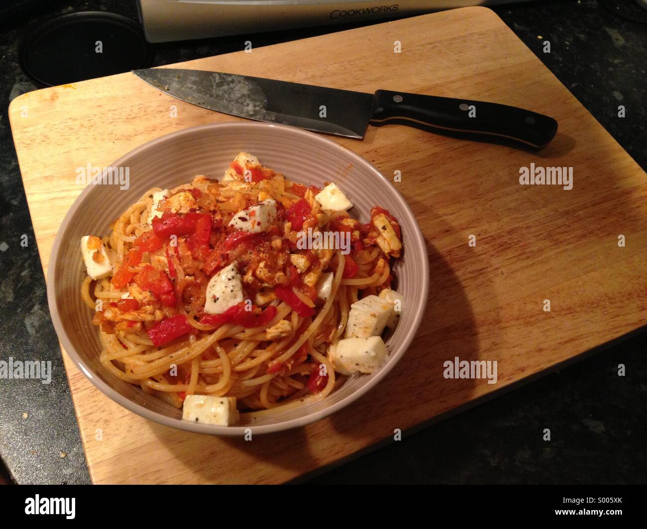Tomato pasta with mozzarella Stock Photo - Alamy