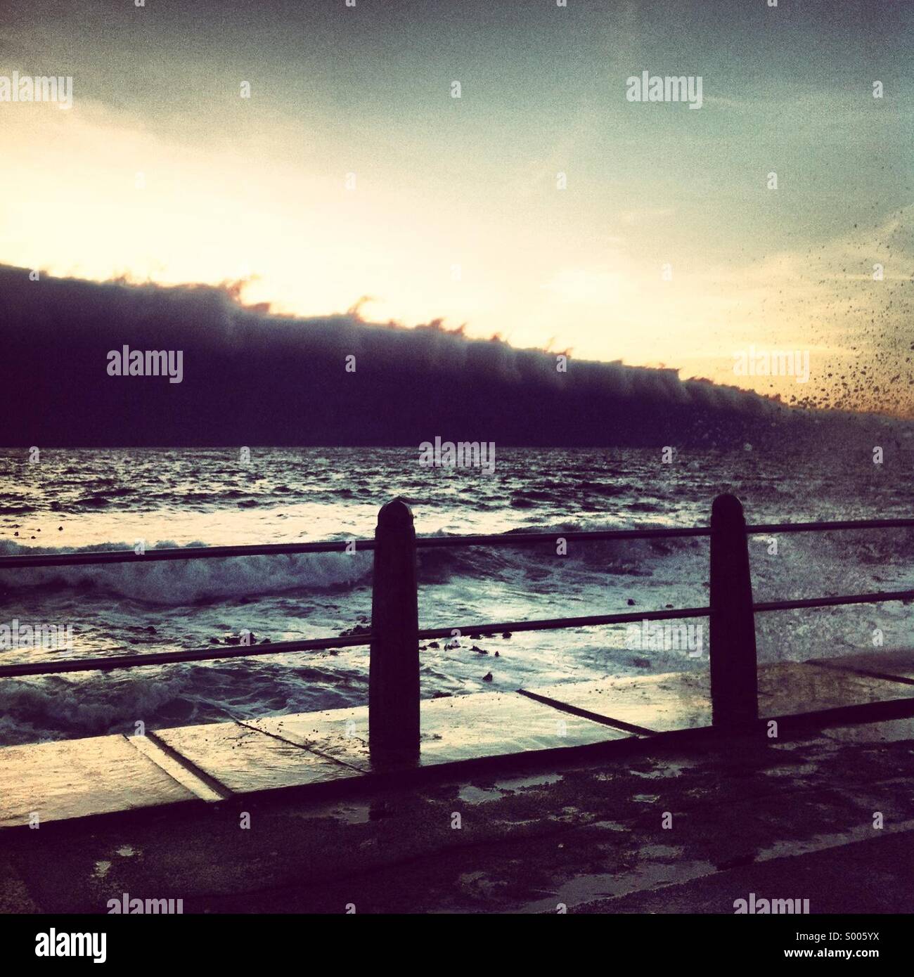 Waves crashing in Mouille Point, Cape Town, South Africa Stock Photo