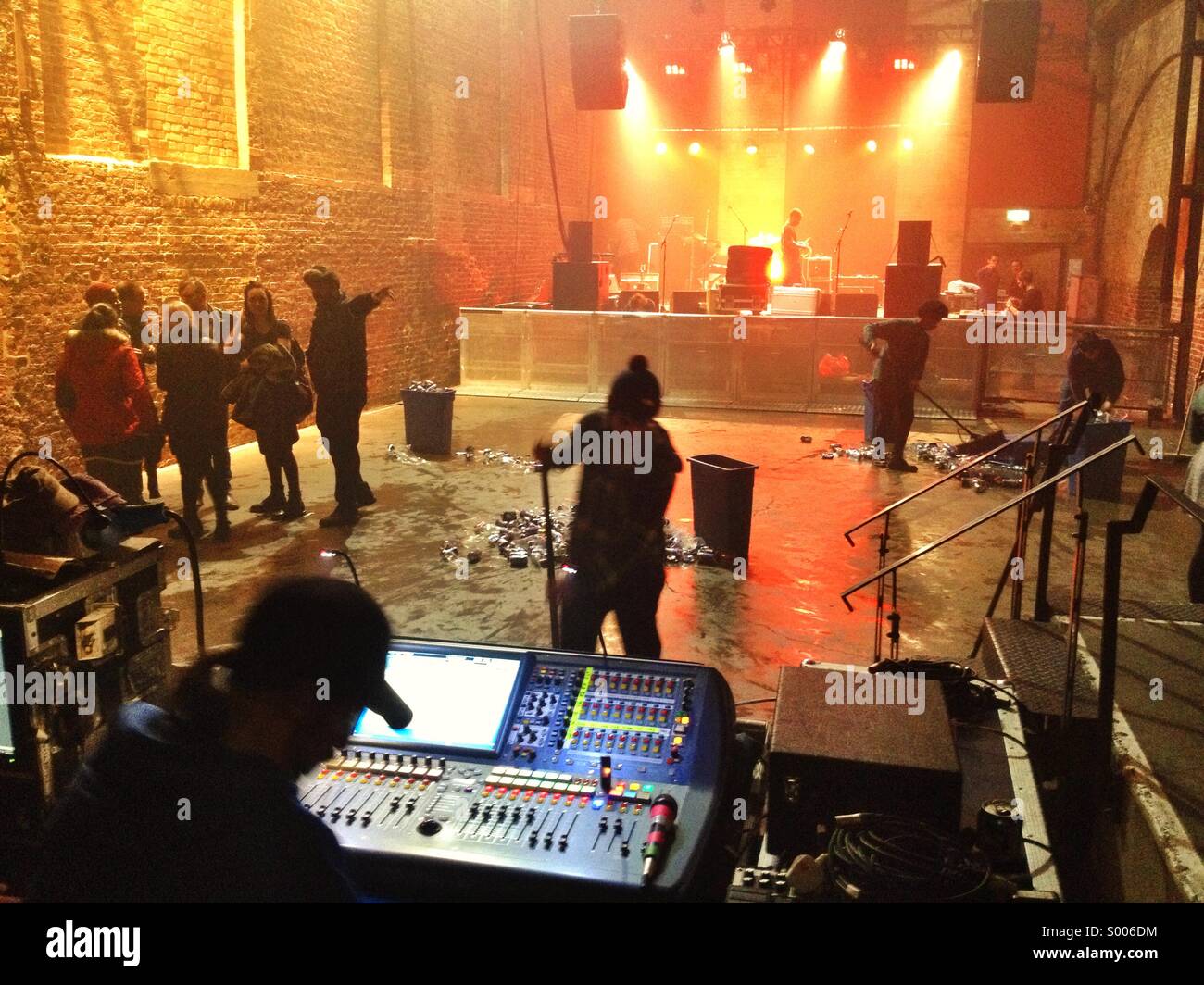 Clearing up after a concert at an East London gig venue. - Smartphone Captured Stock Image