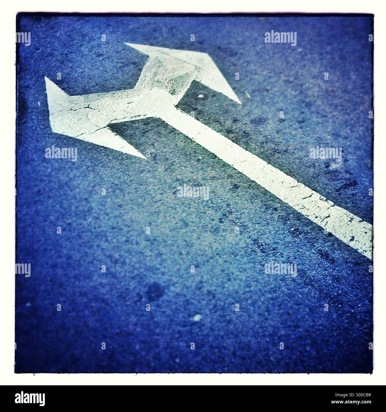 Two directions arrow sign. Decision - Smartphone Captured Stock Image